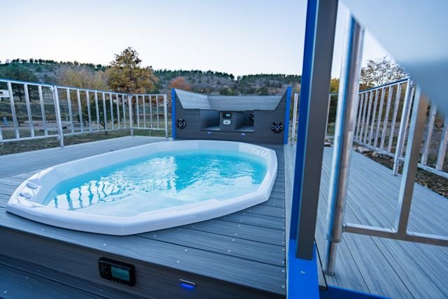Hot tub and lounge seating