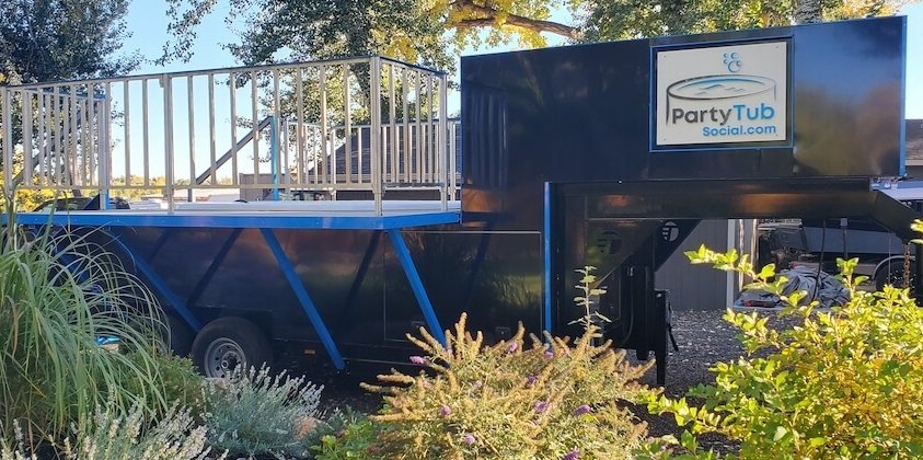 Side view of Party Tub Social mobile hot tub trailer