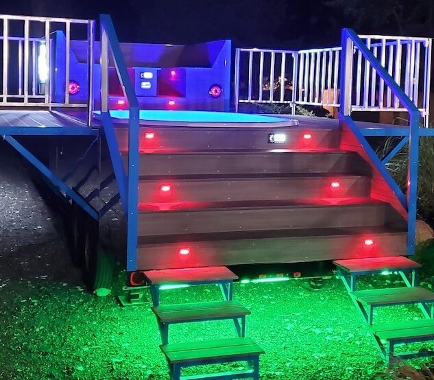 Staircase and colorful lighting on Party Tub Social trailer